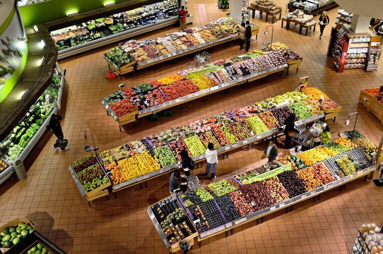 An above view of a grocery store produce section, much like those found in the recently acquired Festival Foods.